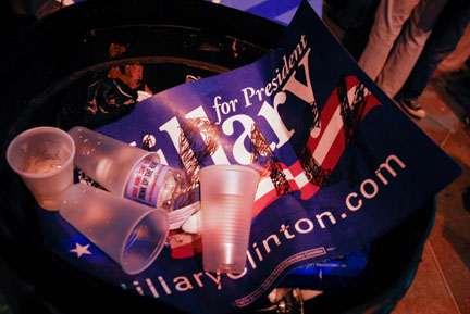 hillary sign in trash can